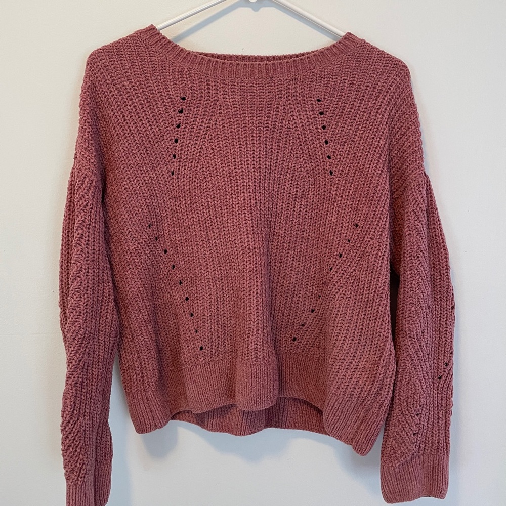 Fuzzy magenta sweater.